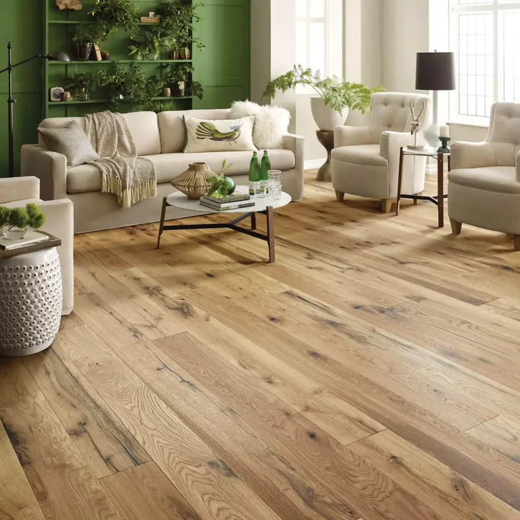 Gray-brown hardwood in a dining room with a dark wood table | Echo Flooring Gallery